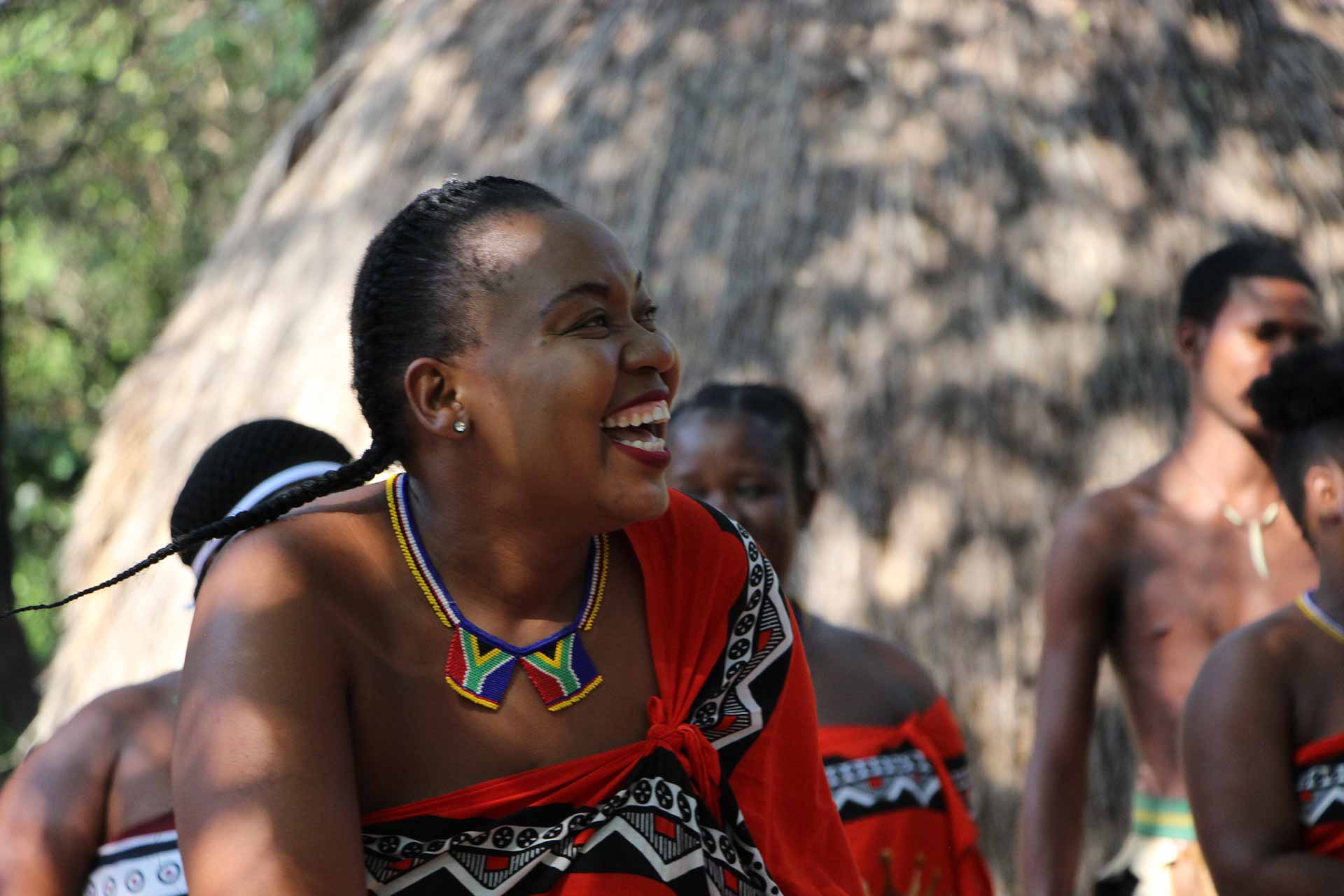 Enjoying a traditional cultural performance of song and dance on the border between South Africa and Eswatini.
