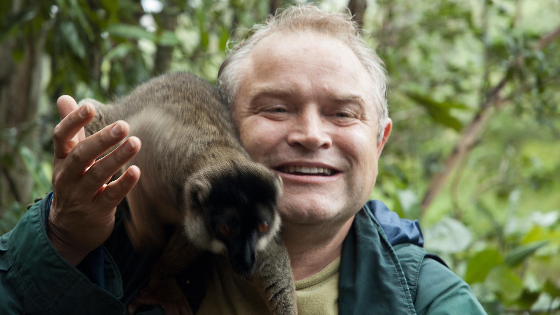 Peter Langer with Red-fronted Brown Lemur, Isalo National Park, Madagascar