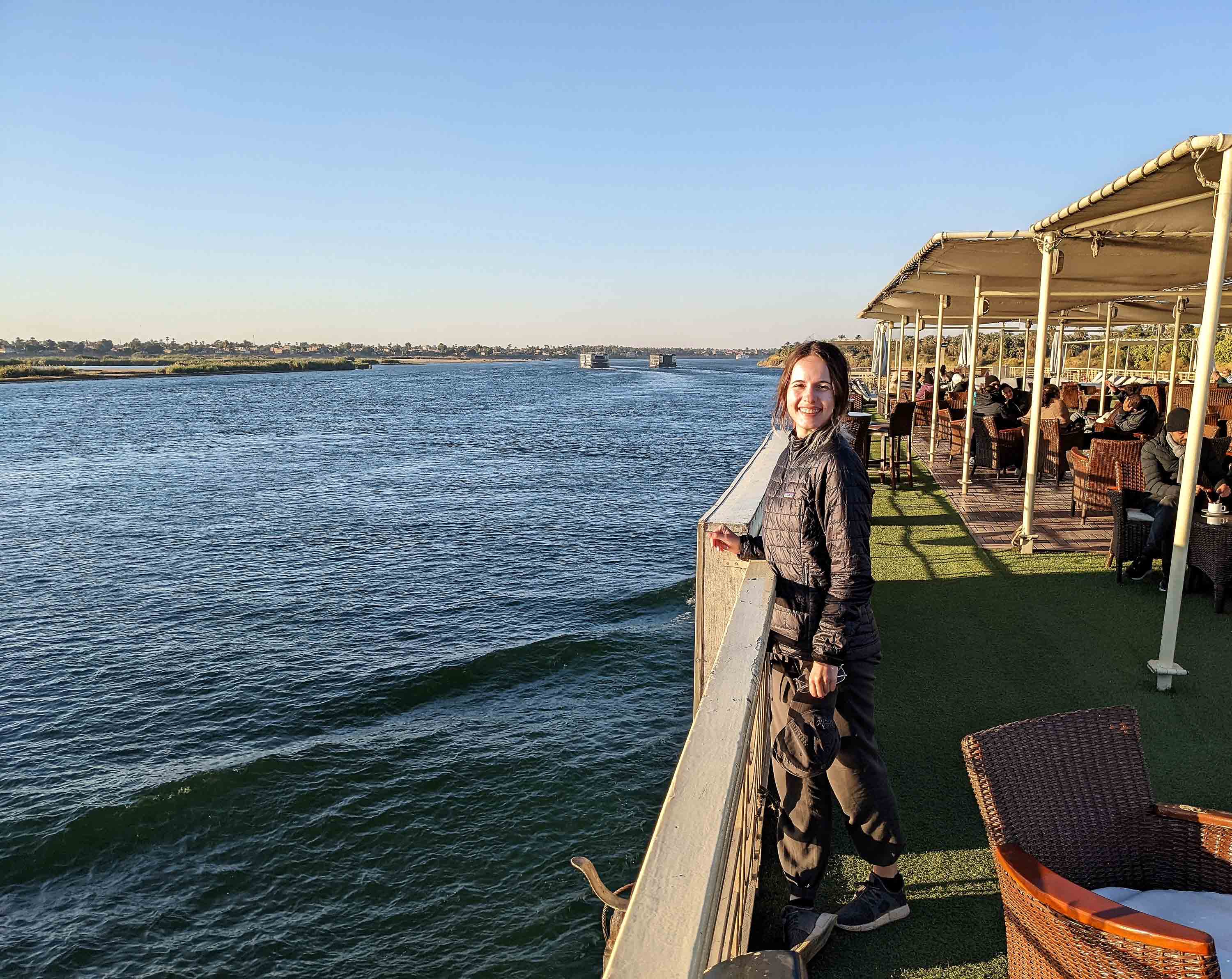Taking in the scenery from the top deck of a Nile cruise ship