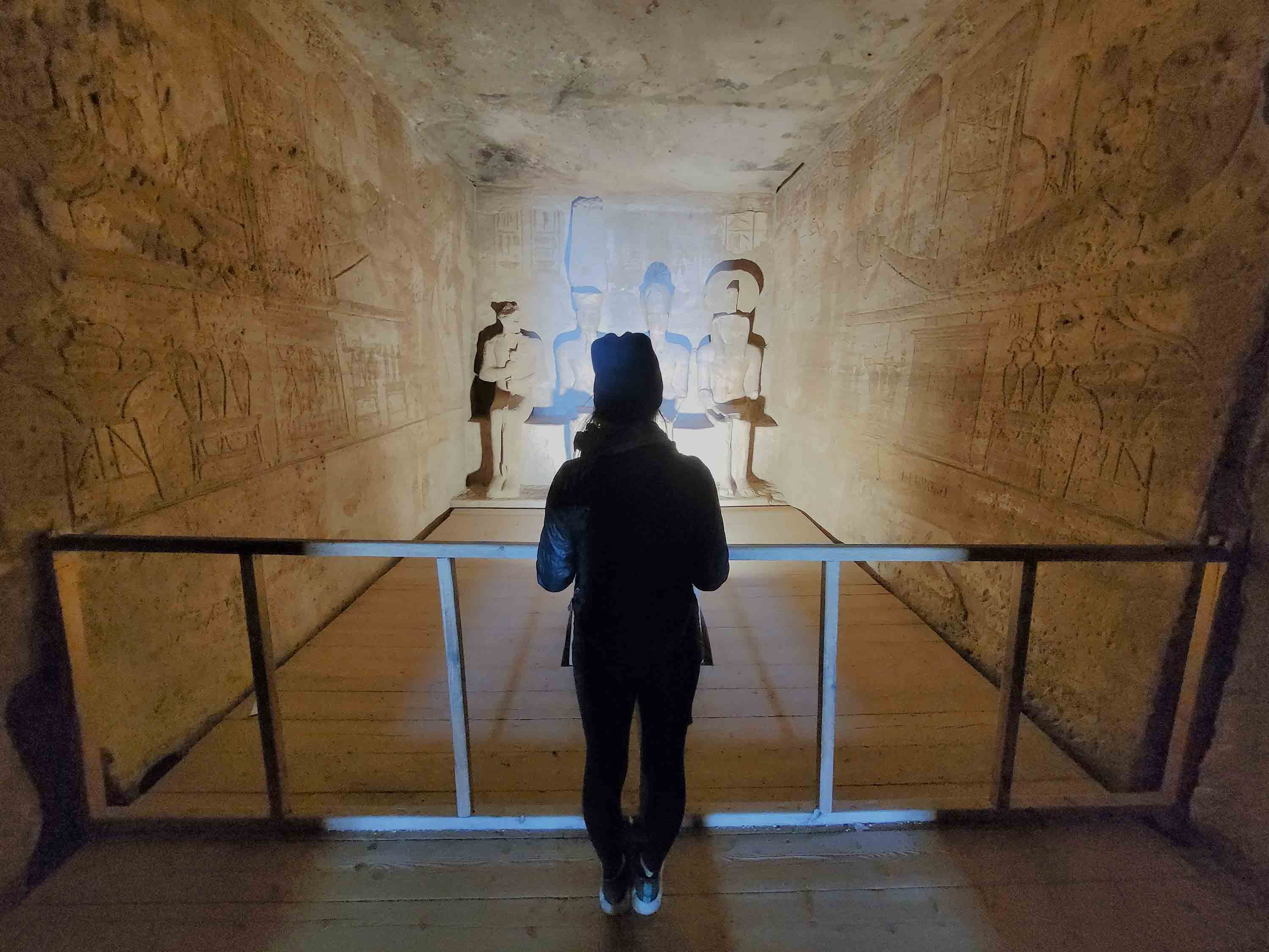 Admiring ancient statues inside the Great Temple of Ramses II at Abu Simbel, Egypt