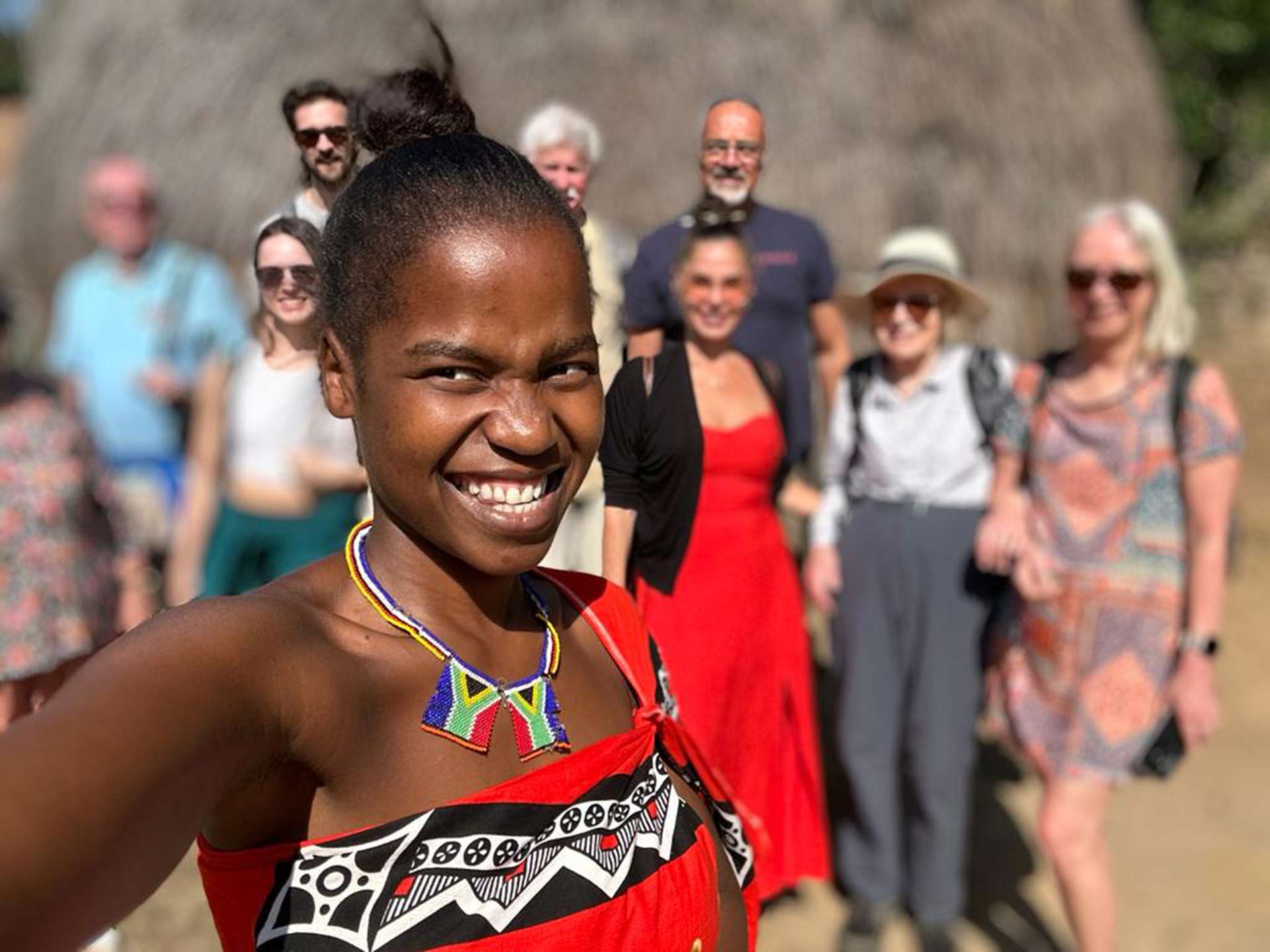 Learning about local culture in a traditional-style settlement on the border of South Africa and Eswatini.