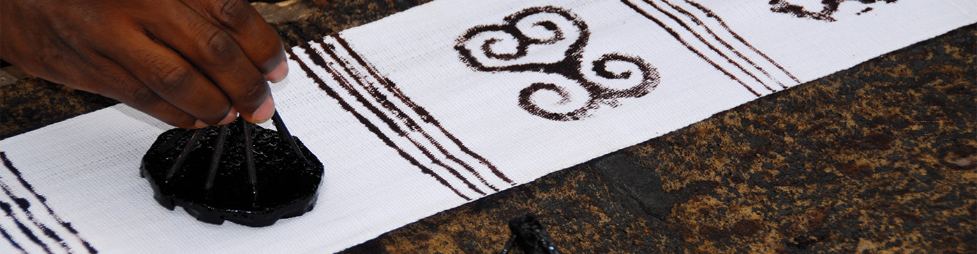 Adinkra cloth is a hand-printed fabric made in Ghana
