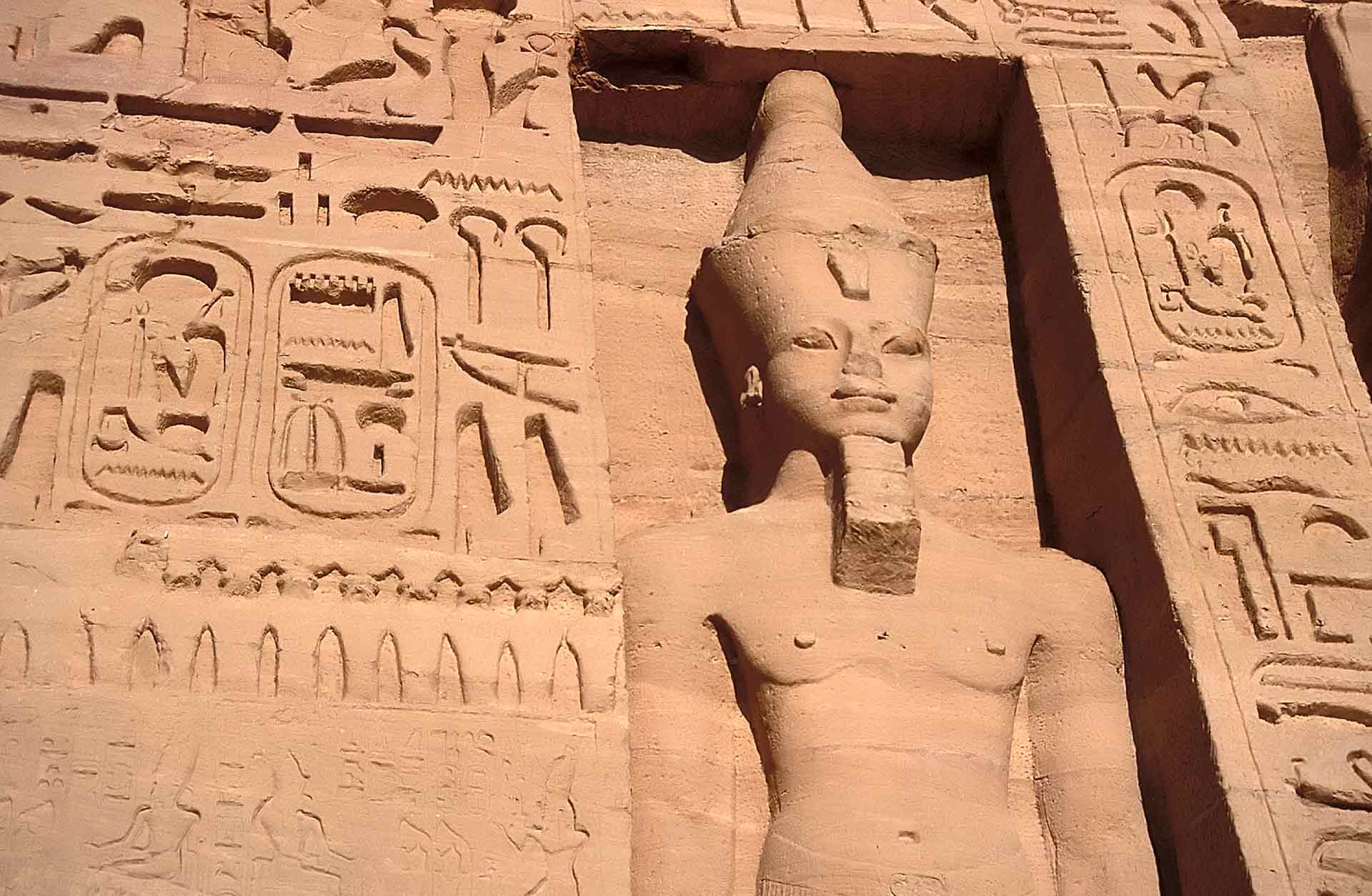 Giant statue of Ramses II on the façade of the Temple of Nefertiti (Temple of Hathor), Abu Simbel, Aswan, Egypt