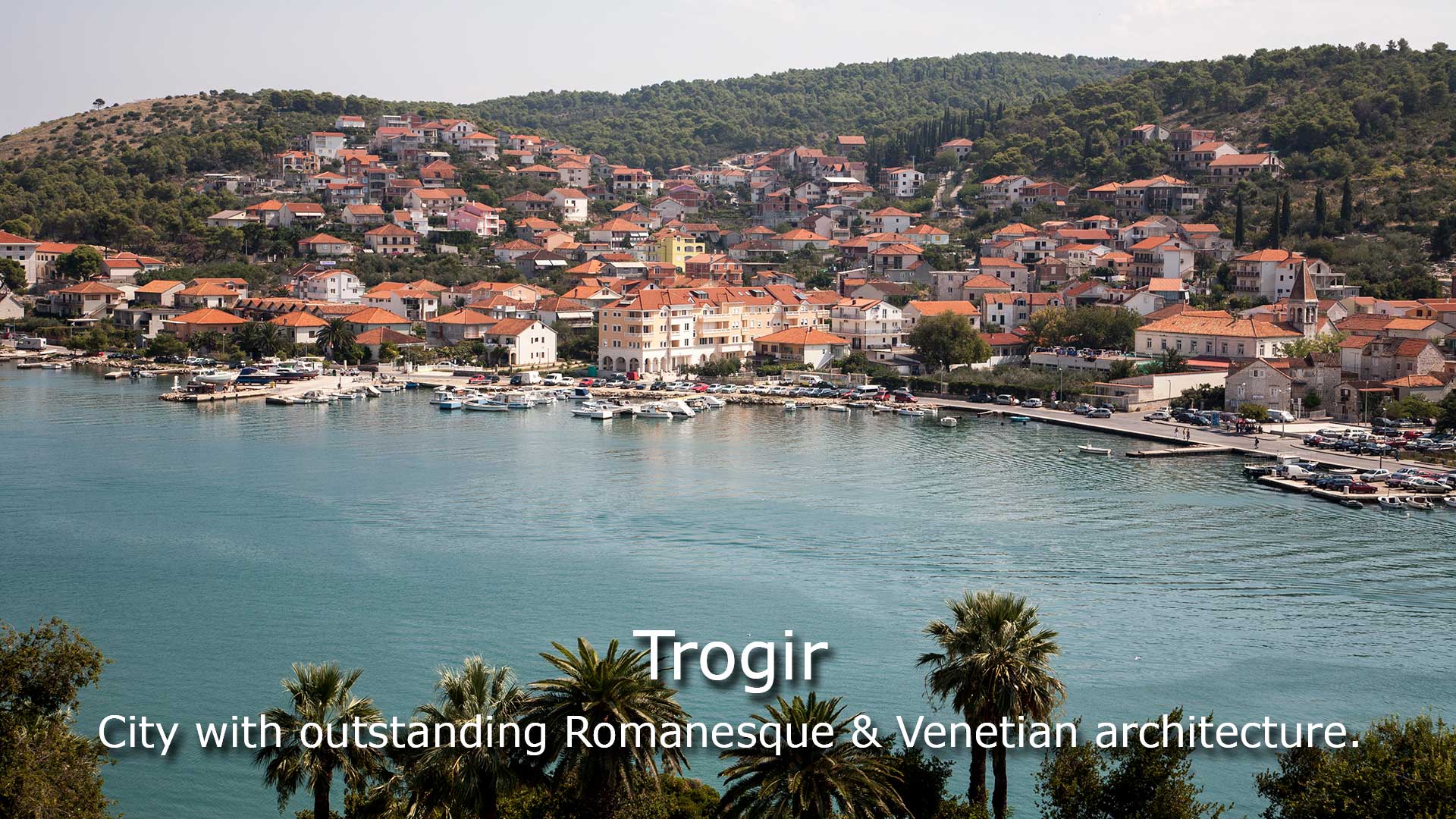 View of sea coast in Trogir town with colorful houses, Dalmatia, Croatia