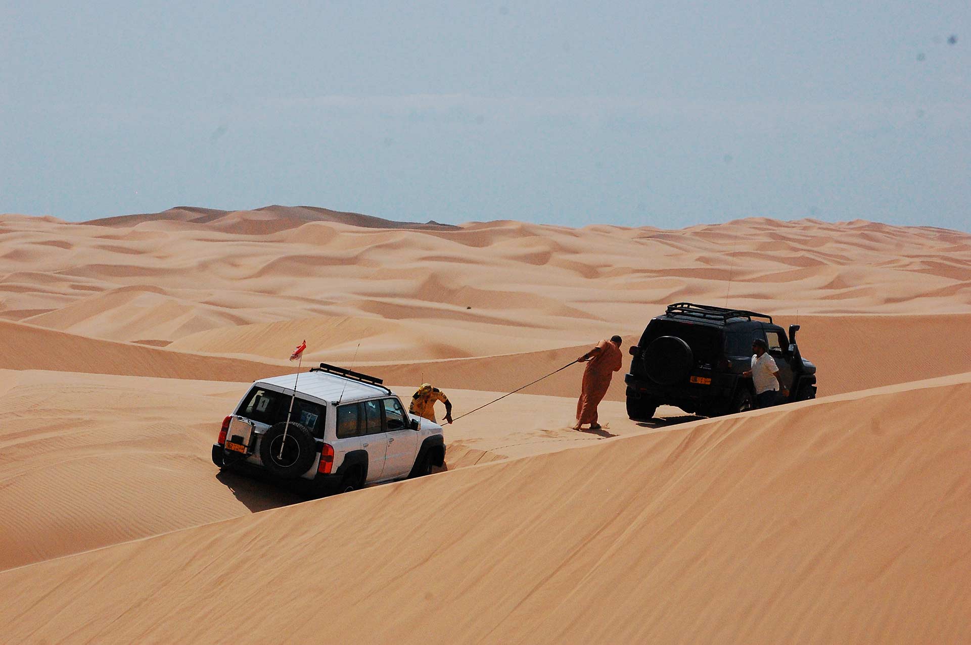 Driving on jeeps on the desert, traditional entertainment for tourists