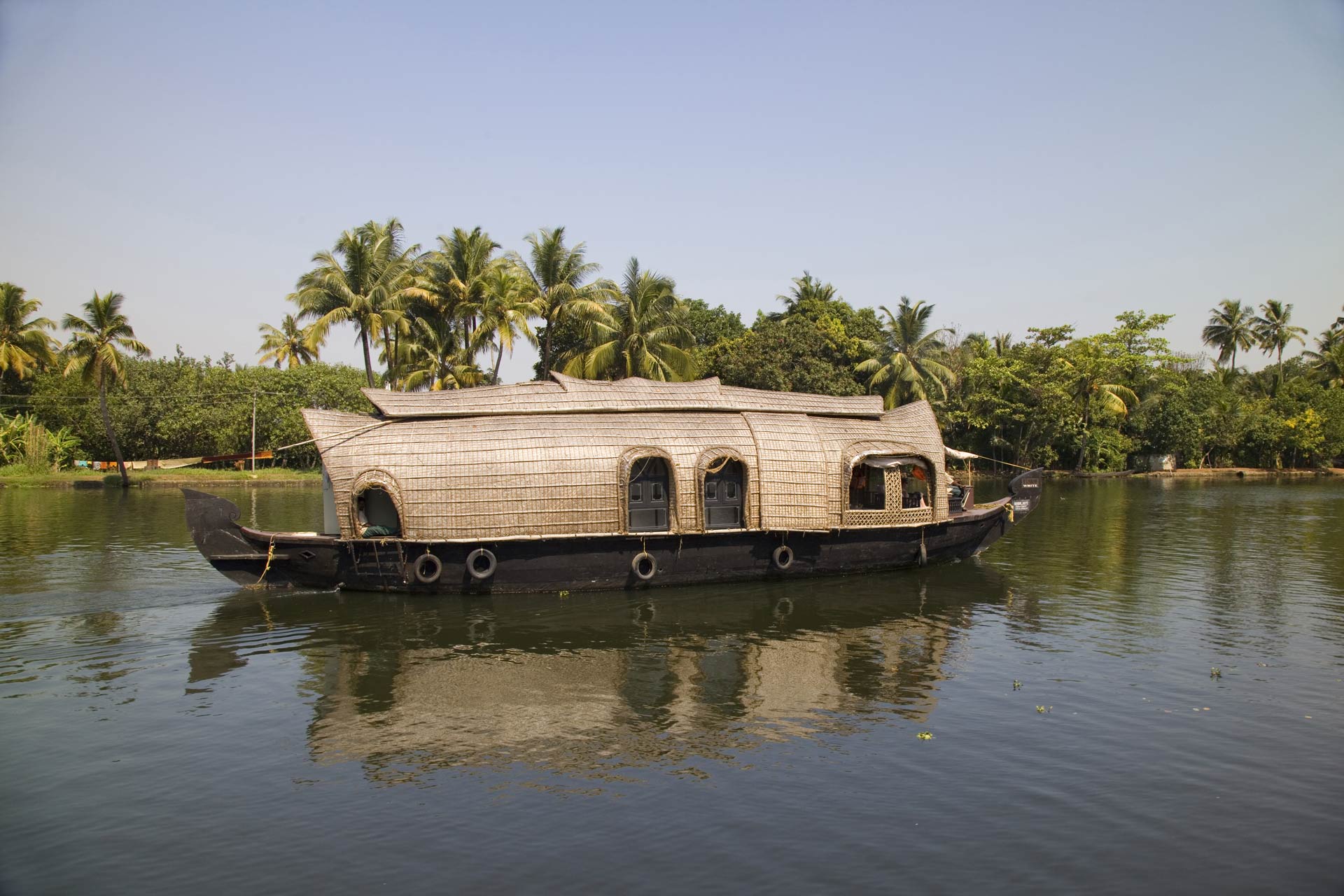 Traditional Indian houseboat near Alleppey on Kerala backwaters, India