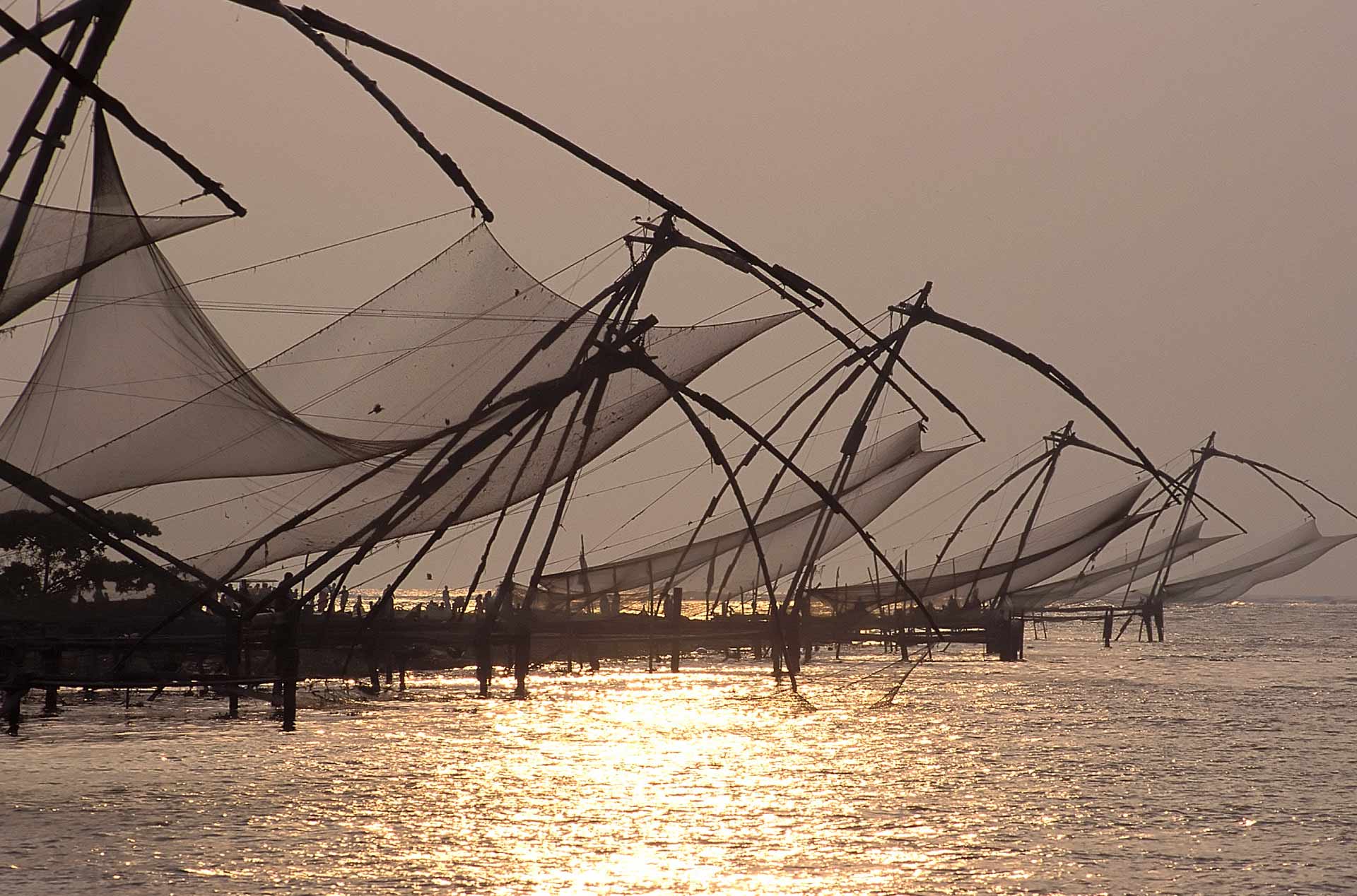 Chinese fishing nets (Cheena vala) at sunset, Kochi, Kerala, India