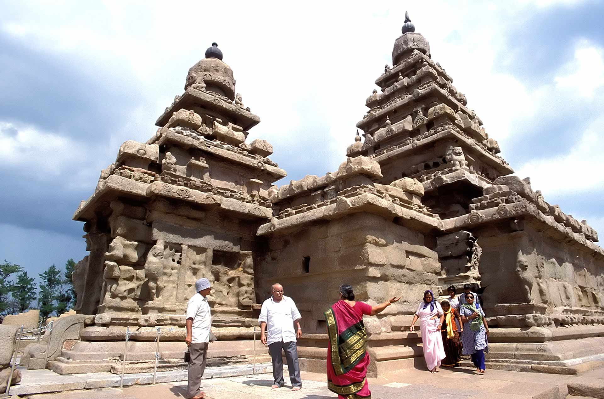 People near the Shore Temple, Mahabalipuram, Tamil Nadu, India