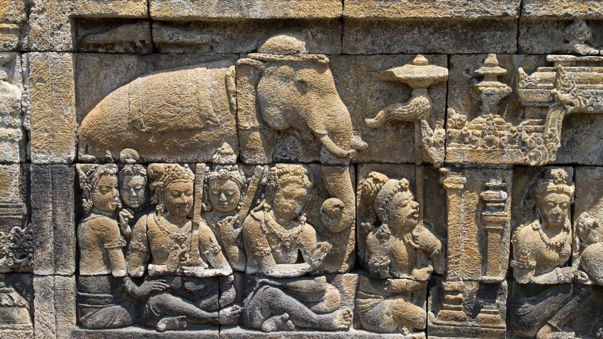 Bas-relief depicting the life of Buddha on a gallery of Candi Borobudur, Borobudur Temple Compounds, Central Java, Indonesia