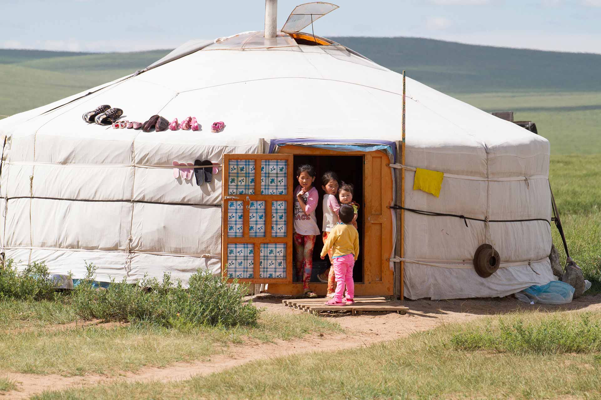 Children by a Mongolian ger (yurt), Mongolia