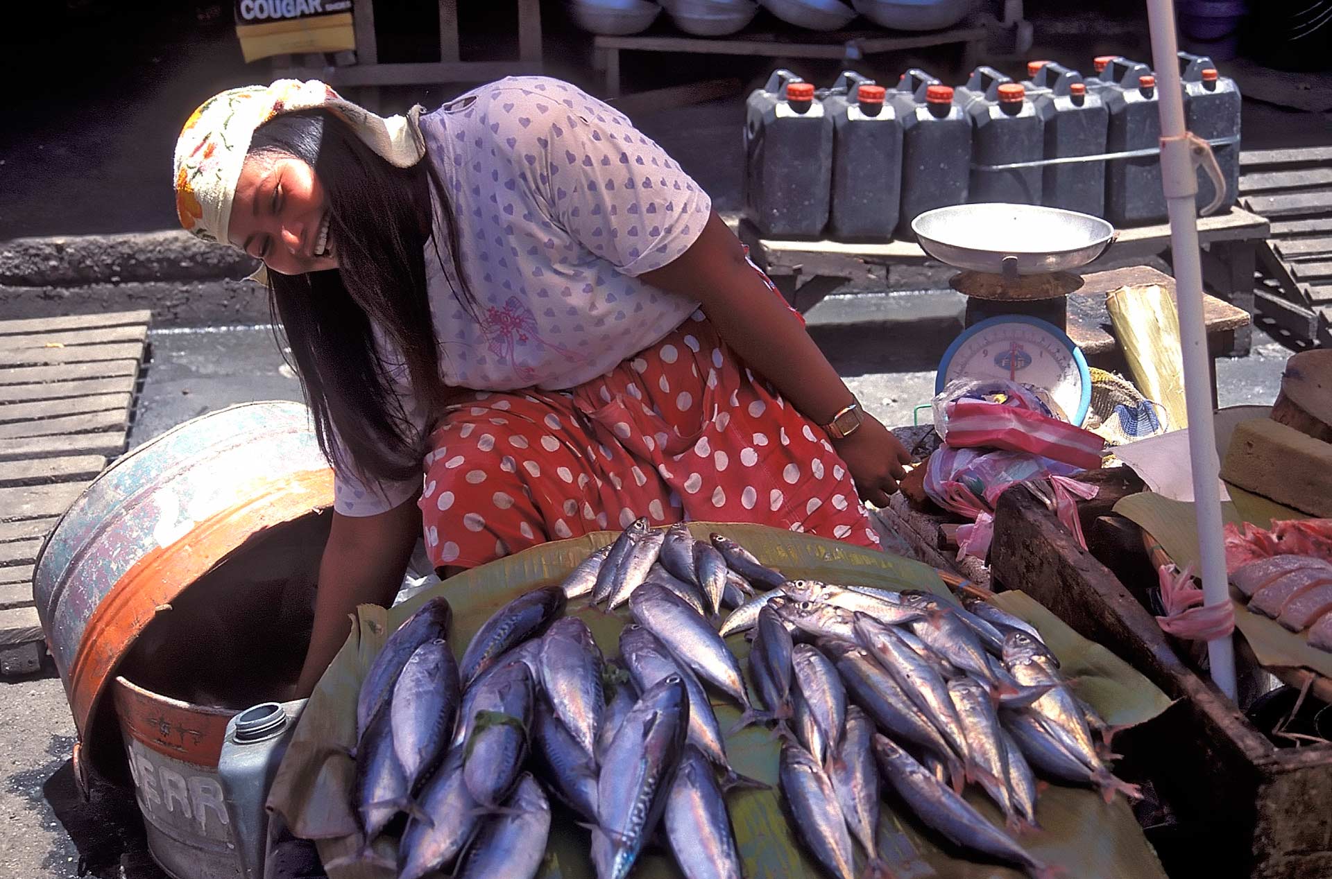 Woman selling fresh fish at a market, Cebu City, Cebu, Philippines